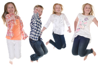 Groups of children jumping in Captured Moment studio in Fleet